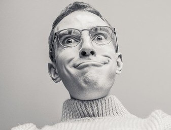 man looking silly with a big smile