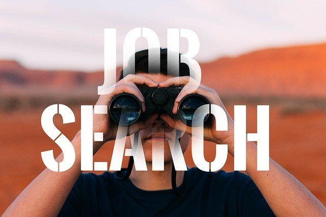 man with binoculars looking for a job