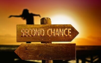 wooden sign says second chance